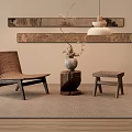 Minimalist Wicker Leisure Chair With Wooden Stool Ceramic Vase And Area Rug In Interior Space