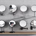 Round Mirrors with Metal Stands Wall Mounted and Tabletop on Gray Wall and Wooden Shelf