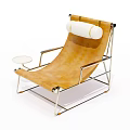 Modern Yellow Leather Lounge Chair with Metal Frame Small Round Side Table and White Cushion