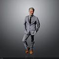 Man in Gray Suit With Tie Standing Hands in Pockets Orange Shoes