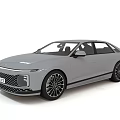 Sleek Gray Modern Sedan With Streamlined Body Front Grille And Alloy Wheels