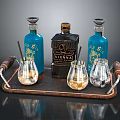 Elegant Beverage Tray Setup With Blue Black Bottles Glasses And Straws For Drink