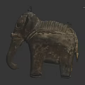 Antique Elephant Sculpture with Carved Textured Surface and Saddle Like Decorative Details
