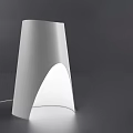 Contemporary White Table Lamp With Sleek Curved Design And Warm Glow