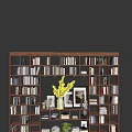 Elegant Wooden Bookcase with Multiple Compartments Books Framed Pictures Potted Plant and Decorative Items