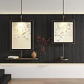 Abstract Paintings in Golden Frames on Dark Wooden Wall with Shelf Featuring Pottery Red Branches
