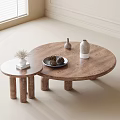 Small and Large Round Wooden Coffee Tables With Pinecones Vases and Book