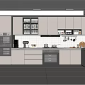 Modern Kitchen Interior With Grey Cabinets White Countertops Built-in Appliances And Hanging Utensils