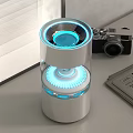 Stylish White Electronic Appliance Featuring Blue Light Ring And Modern Circular Design For Desktop Use 3d model