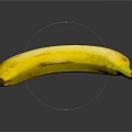 Ripe Yellow Banana With Brown Spots On Shiny Black Background