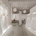 Bright White Wedding Dress Shop Corridor With Wall Mounted Bridal Photos And Reception Desk