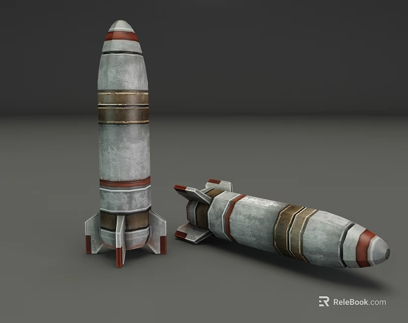 Two Silver Gray Rocket Projectiles With Red And Gold Stripes And Tail Fins 3d model 