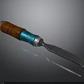 Wooden Handle Chisel With Blue Accent And Metal Blade Crafting Tool
