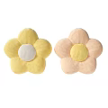 Two Plush Flower Shaped Yellow And Pink Decorative Pillows With Contrasting Centers