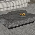 Organic Shape Natural Stone Coffee Table with Black Base Fruit Tray on Gray Living Rug