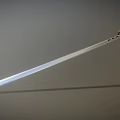 Japanese Katana Weapon With Sharp Metal Blade Traditional Handle And Golden Accent On Gray Background
