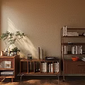 Warm Wooden Sideboards With Open Shelves Books Decorations Potted Plant And Natural Light