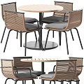 Round Wooden Table And Four Woven Chairs Set With Black Metal Frames And Gray Cushions