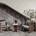Casual Sofa Combination With Woven Chairs Stone Wall Background Small Round Table And Rug Plant
