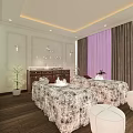 Elegant Spa Room Featuring Two Massage Tables Patterned Sheets White Stools and Decorative Lights