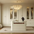 Elegant Modern Walk in Closet with White Cabinetry Glass Doors Central Vanity and Chandelier