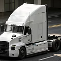 White Semi Truck Cab Design With Urban Road And Building Background