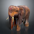 Handcrafted Wooden Elephant Doll With Carved Patterns Red Gem Eyes And White Tusk Details