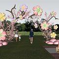 Event Entrance With Pink And White Flowers Branch Design In Grass Field