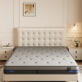 Gray Perforated Mattress On Bed Frame With White Tufted Headboard In Modern Bedroom
