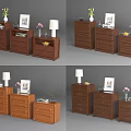 Elegant Modern Wooden Chest of Drawers With Table Lamp Vase and Decorative Frames