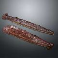 Ancient Carved Metal Sculptures With Intricate Engraved Sword Shaped Design