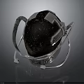 Black Gemstone Sculpture With Silver Metal Ring Stand And Reflective Base