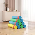 Colorful Rolled Household Yoga Mats Stacked In Modern Blue Living Room