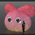 Pink Fluffy Inflatable Model With Large Ears Big Eyes And Person Standing Beside
