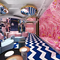 Stylish Hotel Public Lounge Area with Pink Blue Geometric Floor Circular Lighting and Sofas Chairs