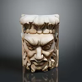Classical Stone Architectural Decorative Element With Intricate Face Carving And Ornate Top Design