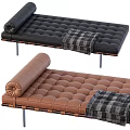Black and Brown Leather Ottoman with Tufted Design Rolled Cushion Plaid Blanket and Metal Legs