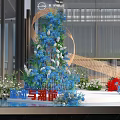 Floral Installation With Blue And White Flowers Spiral Structure In Modern Lobby Water Feature
