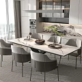Modern Dining Table Set With Marble Top Grey Chairs Green Plant And Natural Light
