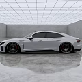 White Sports Coupe With Sleek Design In Modern Indoor Space With Reflective Floor