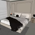 Cozy Double Bed with Soft Blanket Nightstands Table Lamps and Vase in Neutral Tones Bedroom
