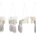Woven Hanging Chairs With Tassels And Gray White Cushions For Home Decor