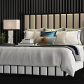 Double Bed Interior Featuring Striped Headboard Blue Orange Pillows And Bedside Table Lamps