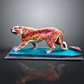 Colorful Leopard Sculpture With Blue Base As Decorative Art Piece