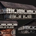 Traditional Ancient Timber Framed Building Two Story With Sloped Roof White Exterior And Wooden Windows