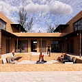 Earthen Courtyard Architecture With Open Space Fire Pit People Sitting And Trees