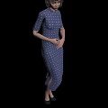 A Woman Wearing a Traditional Blue Qipao With White Polka Dots