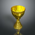 Exquisite Golden Carved Goblet Featuring Intricate Sculpted Patterns And Ornate Base