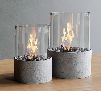 Two Transparent Glass Fireplaces With Gray Concrete Base Stones And Burning Flames On Wooden Table 3d model