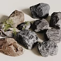 Natural Stones and Wood Decorative Elements with Green Foliage Accents